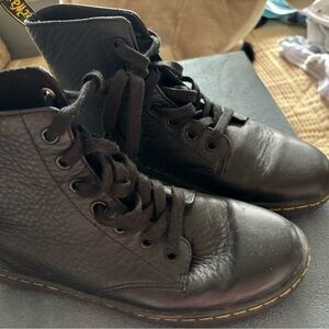 Dr Marten These are not the typical heavy bottom boot but sleek and comfortable.